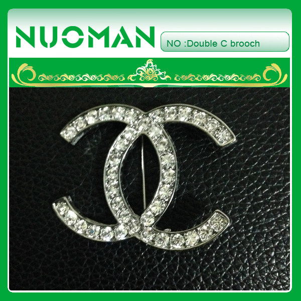 DOUBLE C BROOCH